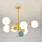Suspension Moderne 6 Lumières Finition Dorée Globes en Verre Blanc